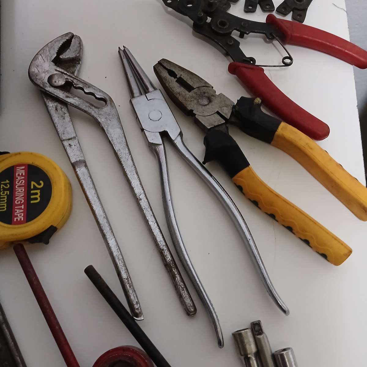 toolbox with various hand tools.
