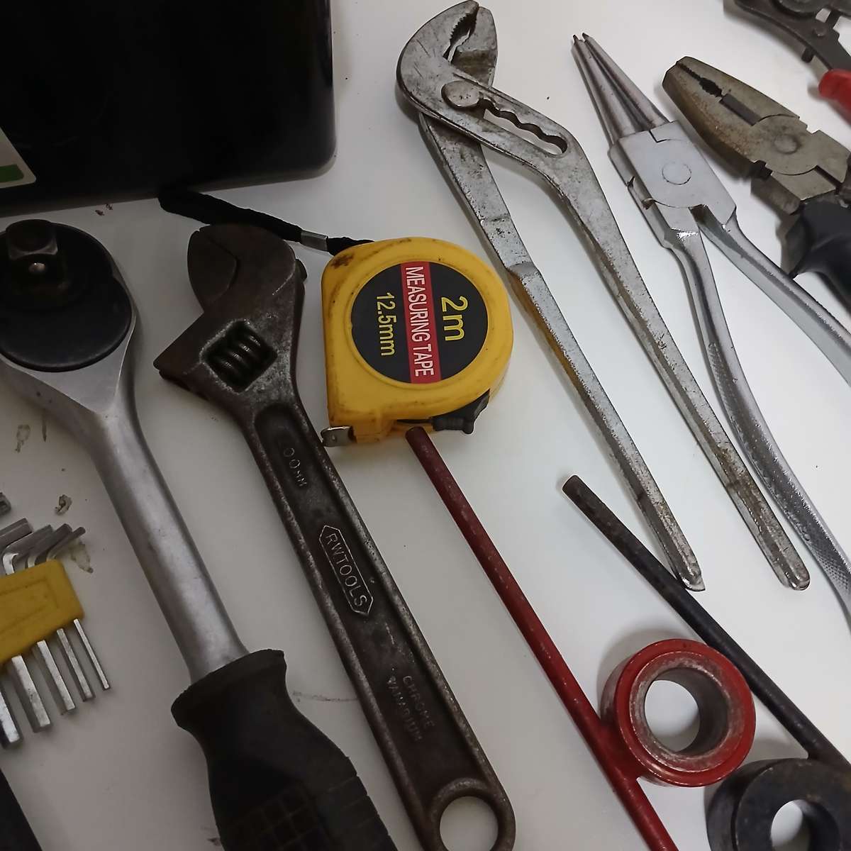 toolbox with various hand tools.