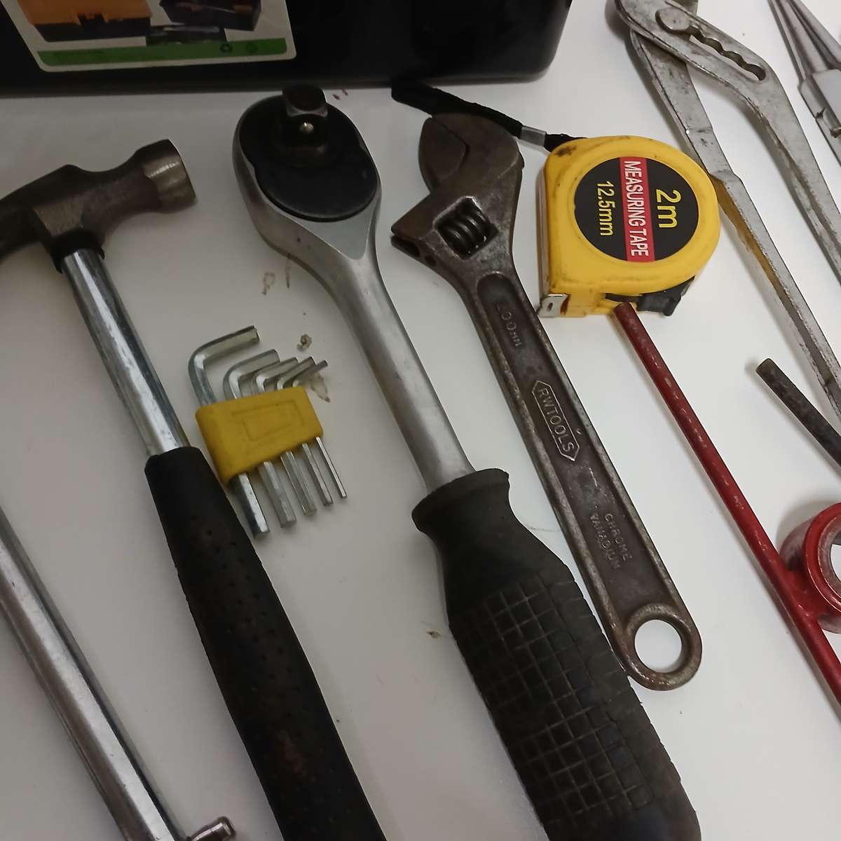 toolbox with various hand tools.