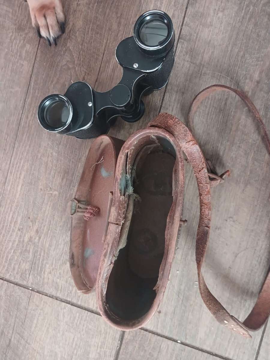 Antique binoculars with leather carry bag