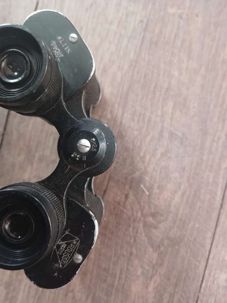 Antique binoculars with leather carry bag