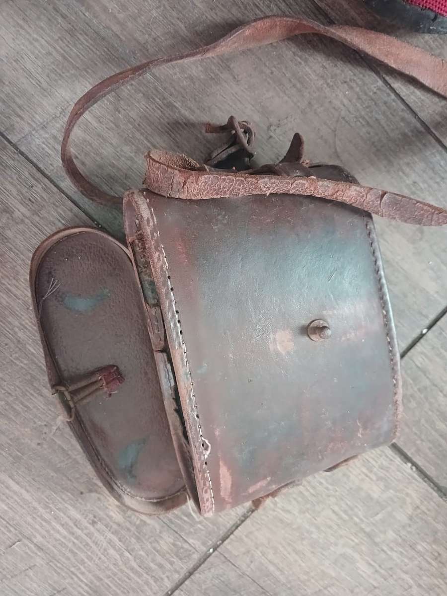 Antique binoculars with leather carry bag