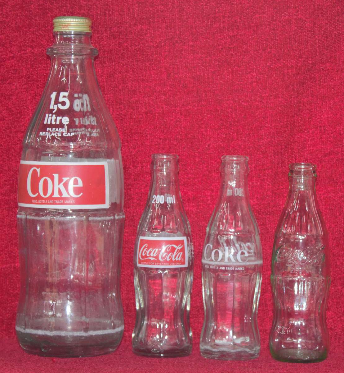 Coca Cola Bottles x 4