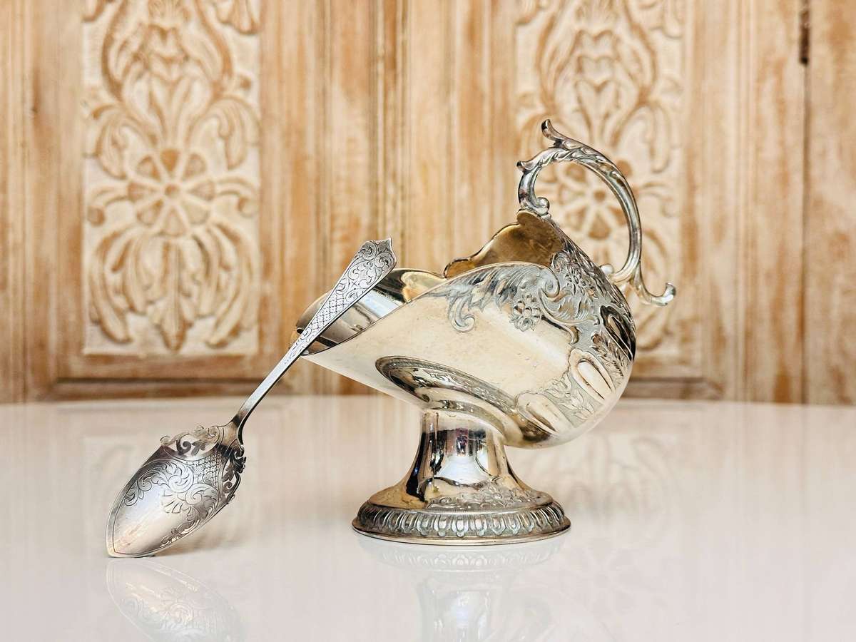 Elegant Vintage Sugar Server with Ornate Detailed Spoon
