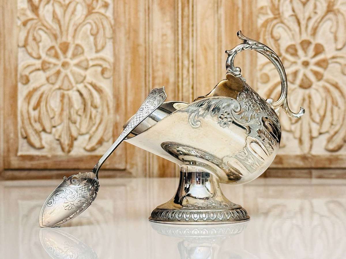 Elegant Vintage Sugar Server with Ornate Detailed Spoon