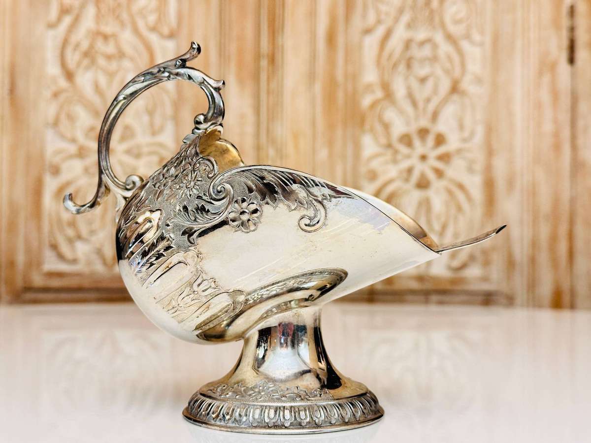 Elegant Vintage Sugar Server with Ornate Detailed Spoon