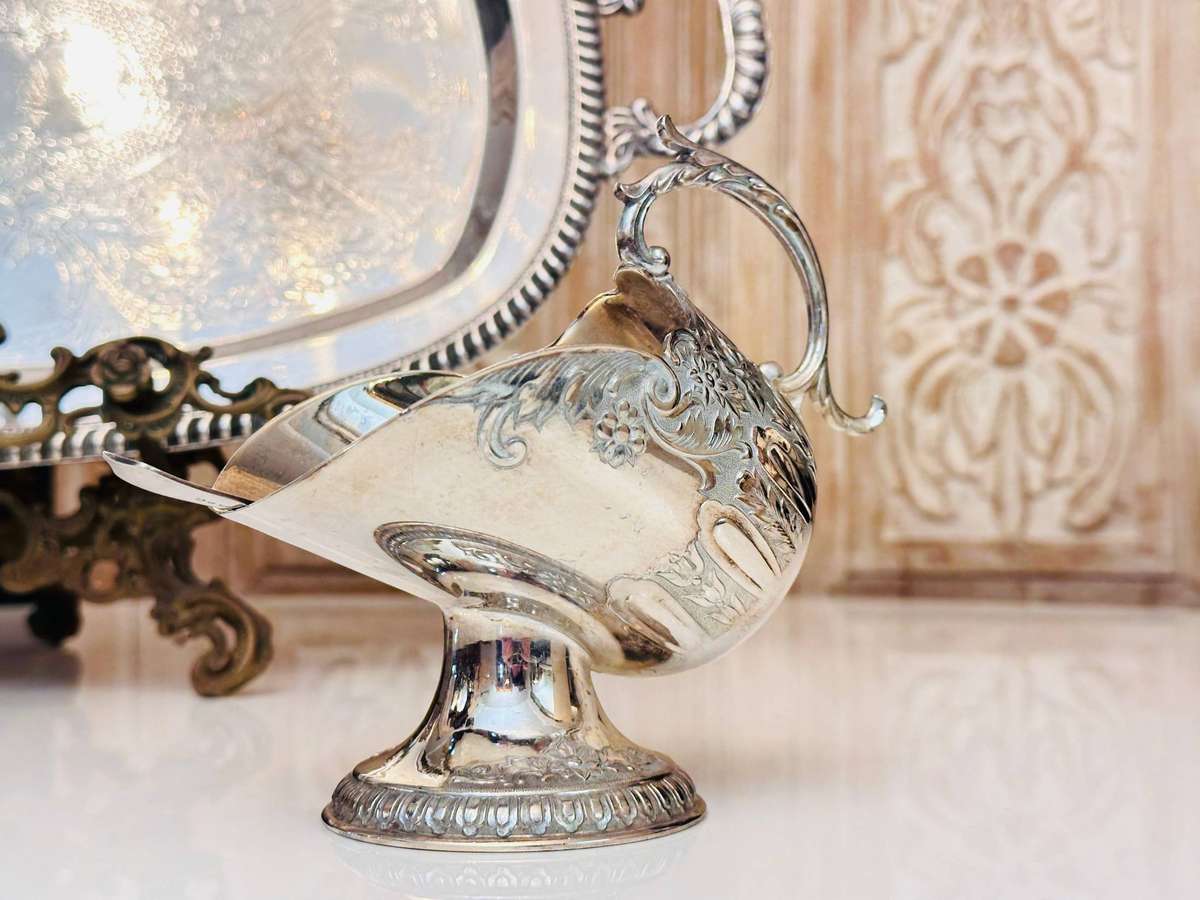 Elegant Vintage Sugar Server with Ornate Detailed Spoon