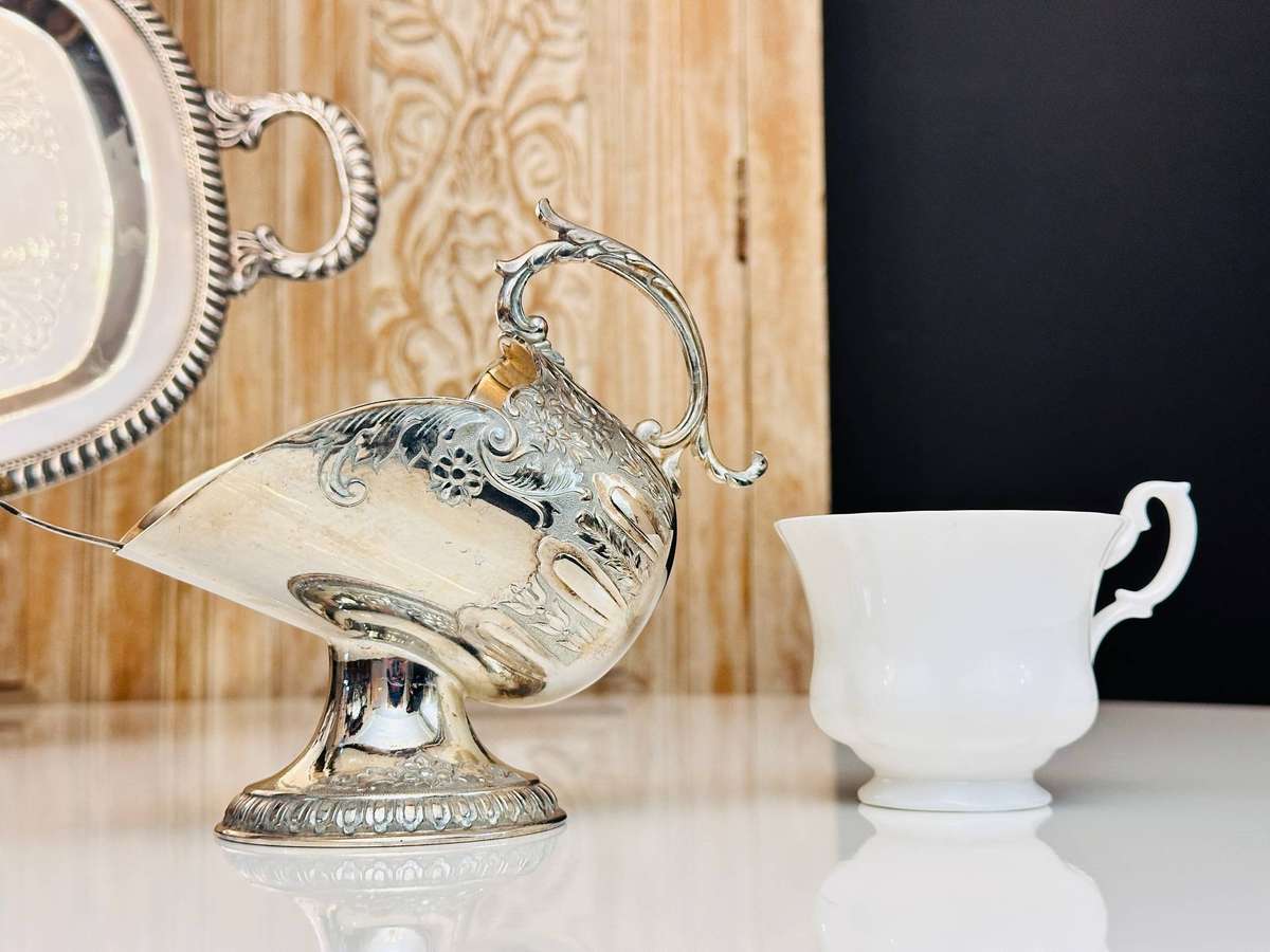 Elegant Vintage Sugar Server with Ornate Detailed Spoon