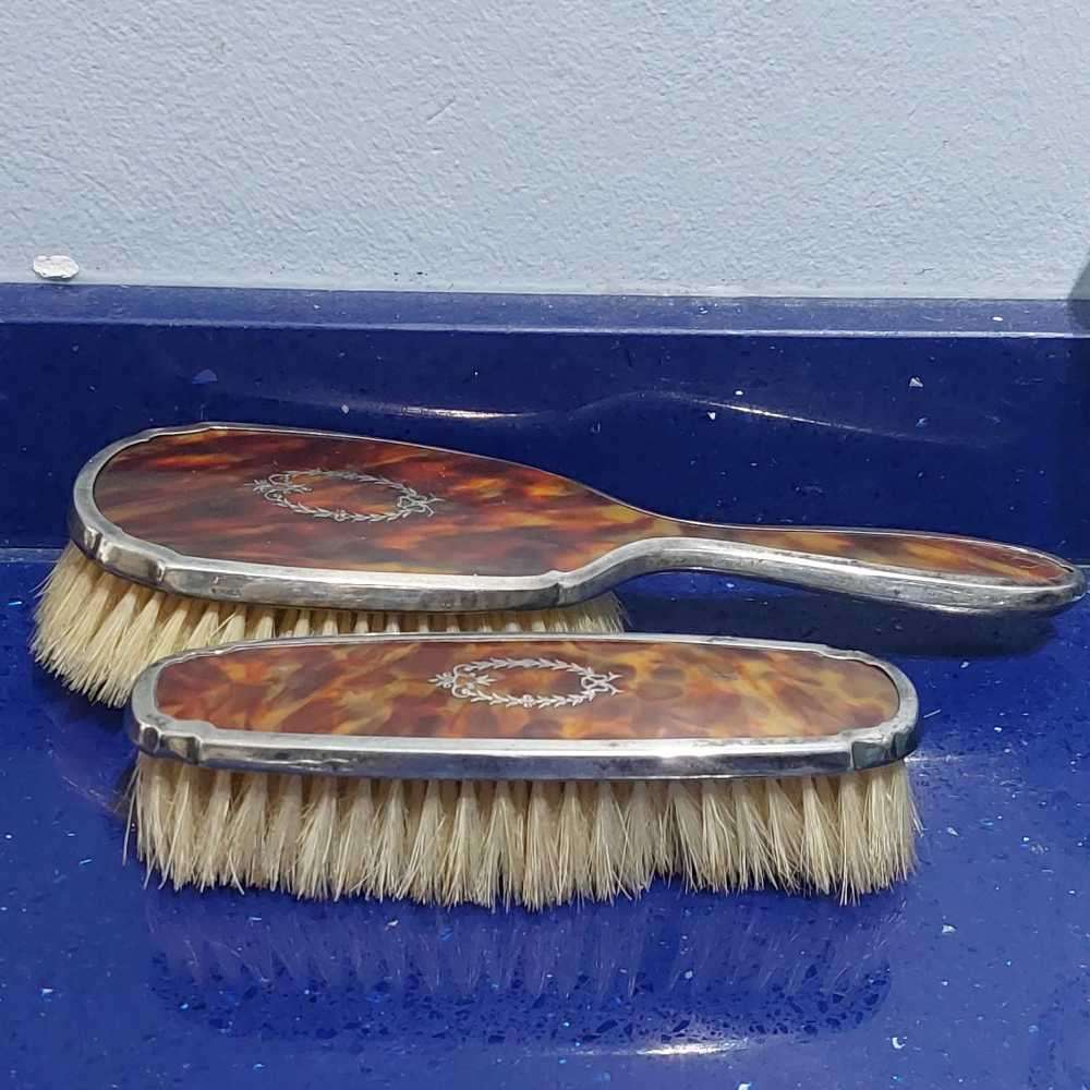 Vintage brushes with silver edges