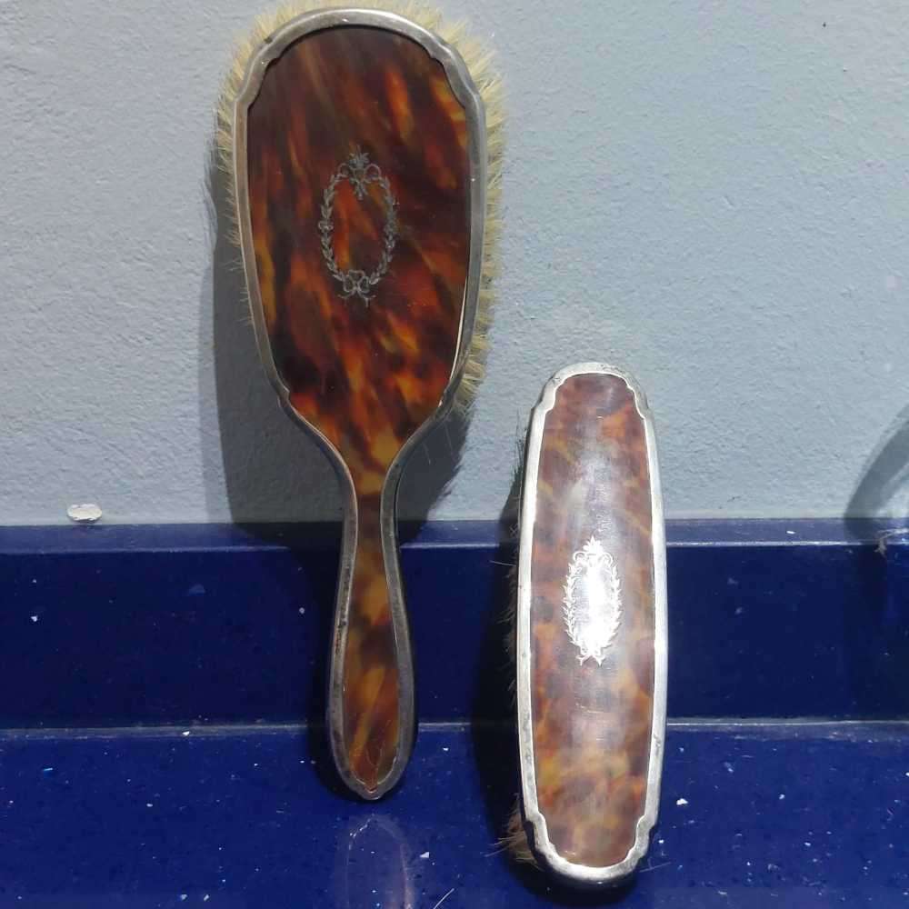 Vintage brushes with silver edges