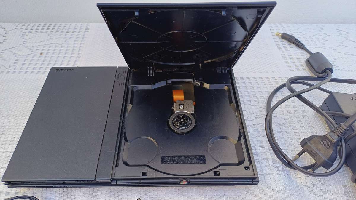 Ps2 Slim + Controller up for bid [Read description]