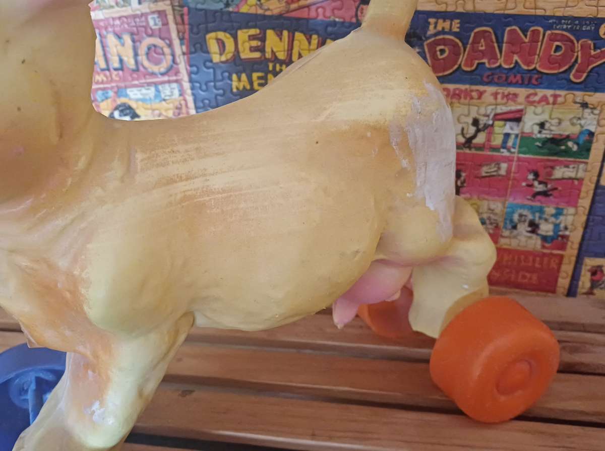 Vintage Rolling Cow Toy