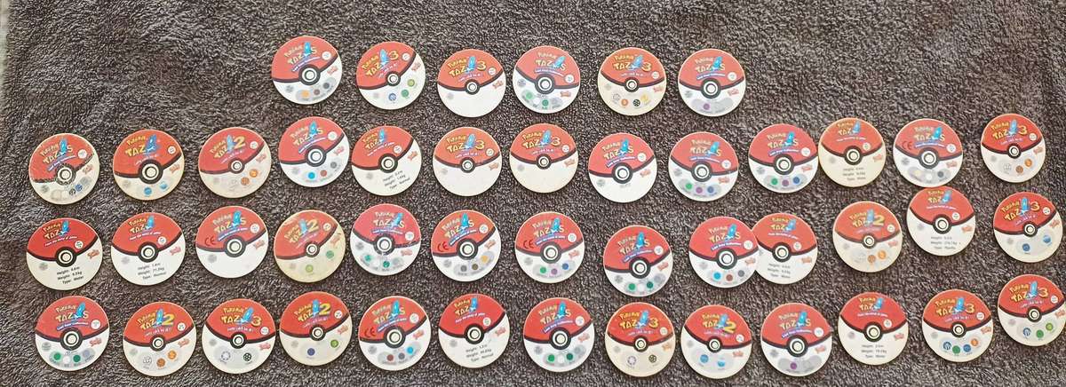 Bundle of Mixed 3D & Normal Pokemon Tazos + Pouch