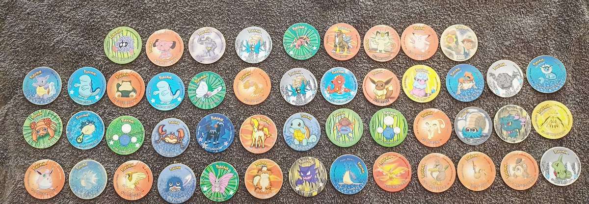 Bundle of Mixed 3D & Normal Pokemon Tazos + Pouch