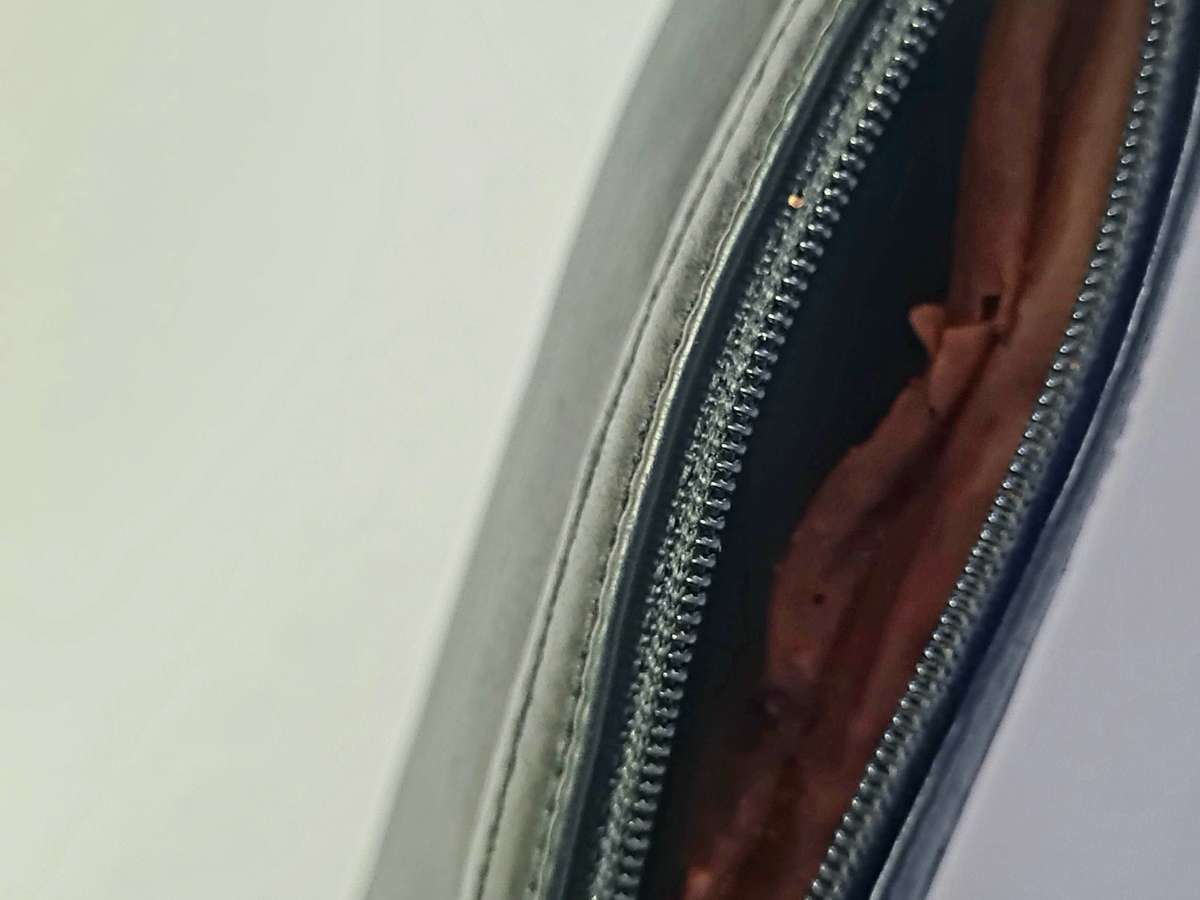 Smoking pipe, pipe cleaning tool and tobacco pouch.