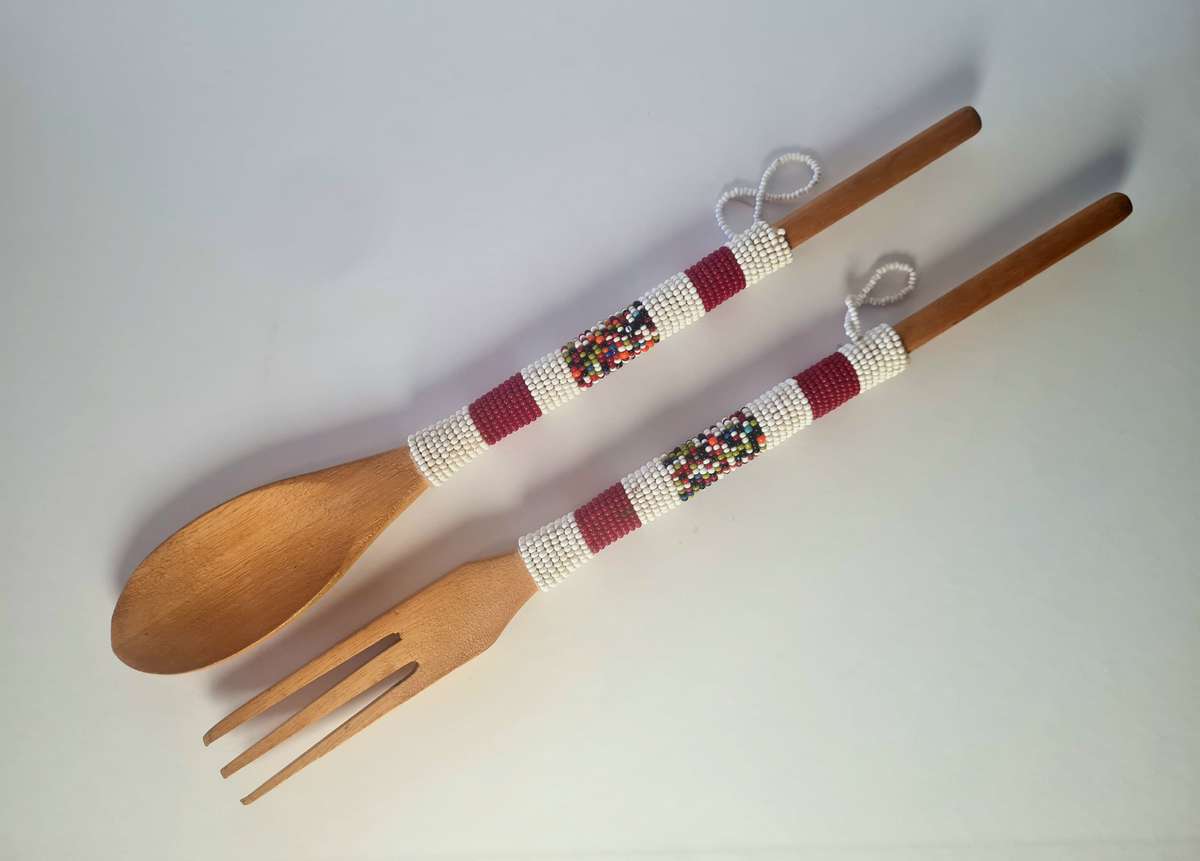 Salad servers, wooden with bead detail.