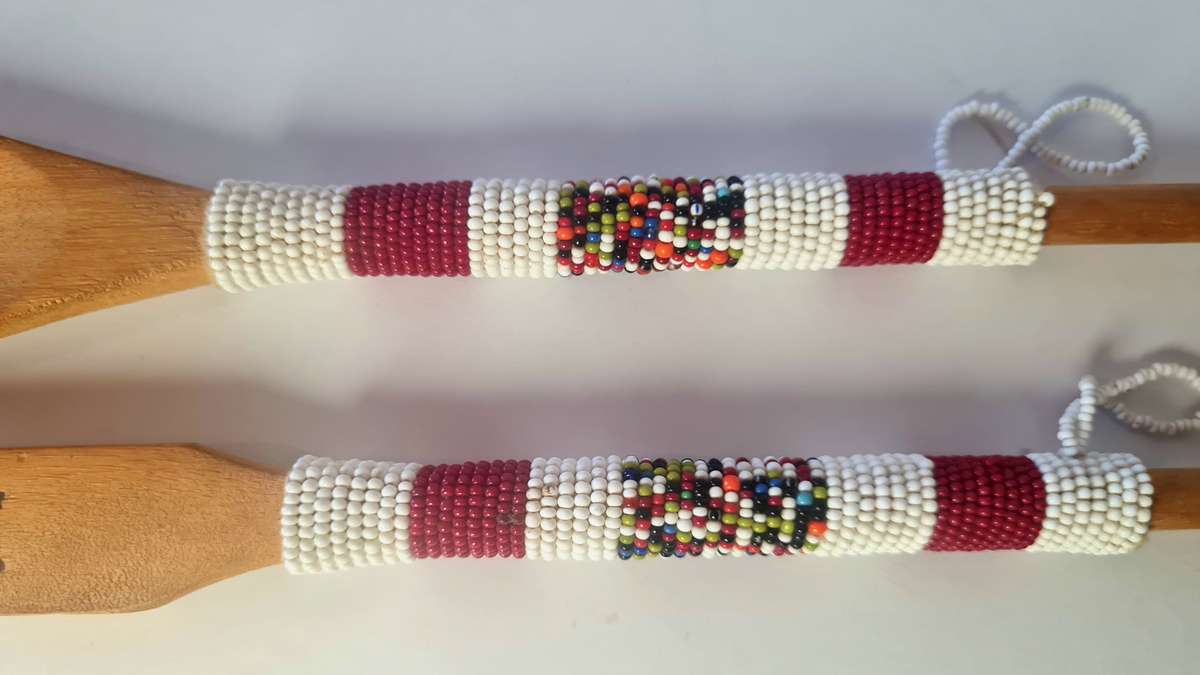 Salad servers, wooden with bead detail.