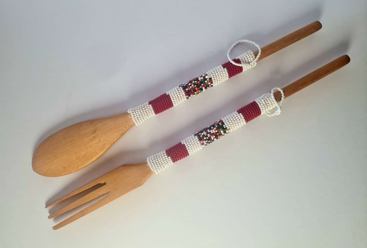 Salad servers, wooden with bead detail.