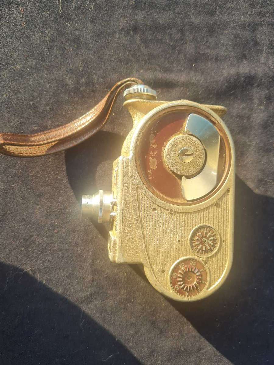 Bell & Howell, sportster. Movie camera.