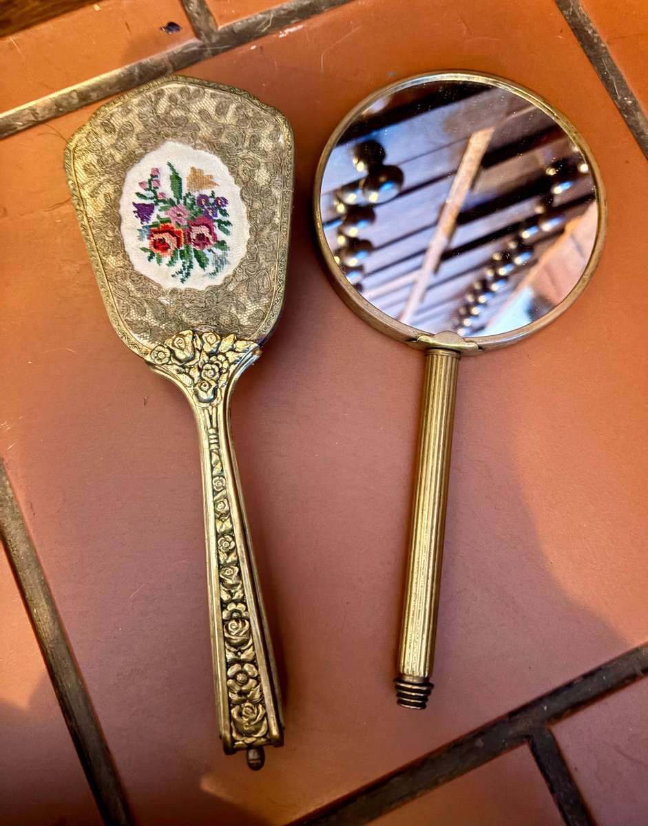 Antique mirror and hair brush