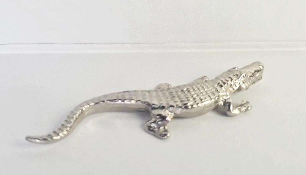 Miniature metal crocodile