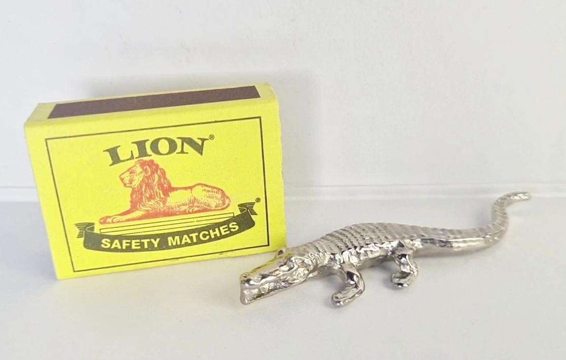 Miniature metal crocodile