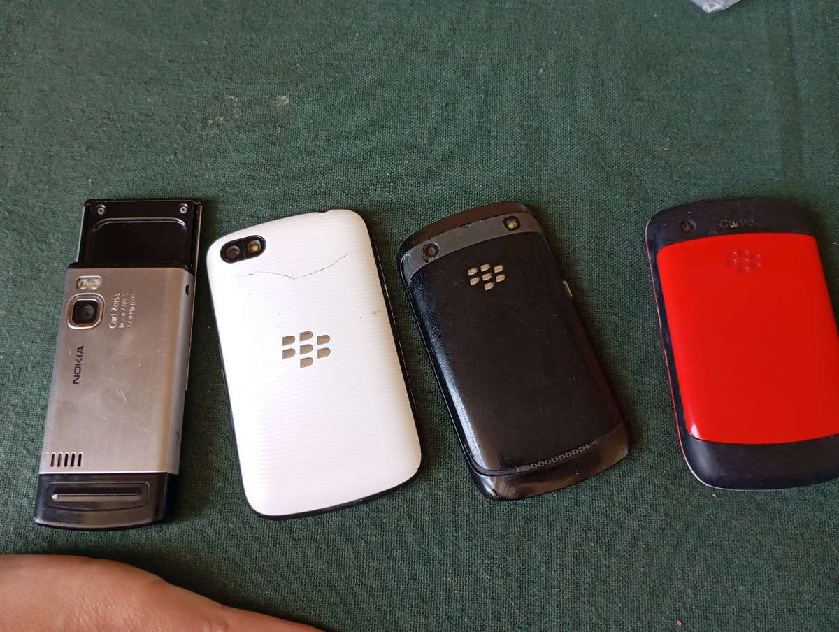 3 x Blackberry and 1 nokia 6500 slide phone
