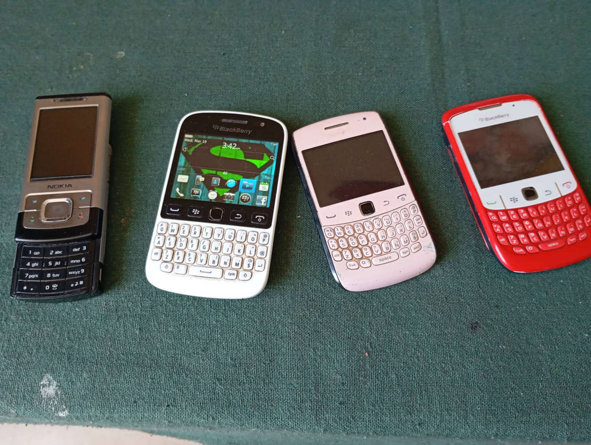 3 x Blackberry and 1 nokia 6500 slide phone