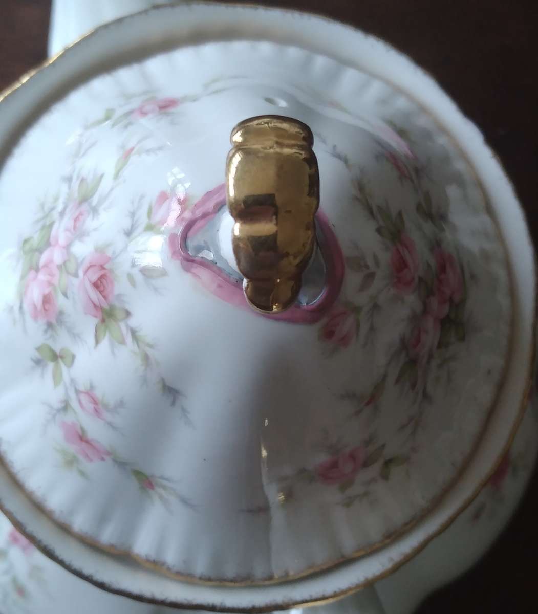 Paragon Victoria rose Teapot with Manufacturing fault on lid handle.
