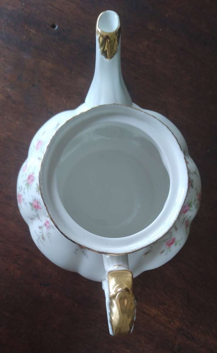 Paragon Victoria rose Teapot with Manufacturing fault on lid handle.