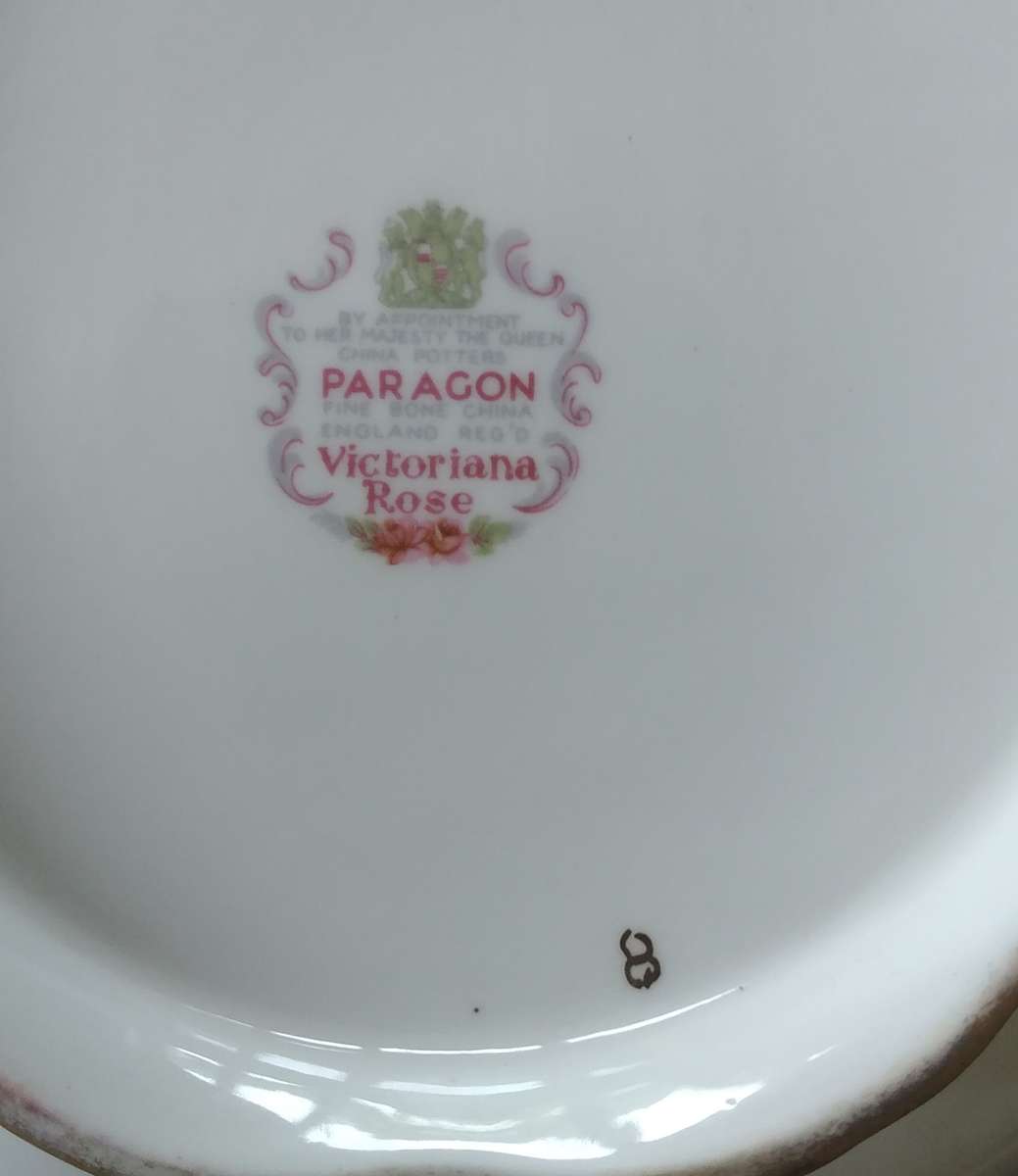 Paragon Victoria rose Teapot with Manufacturing fault on lid handle.