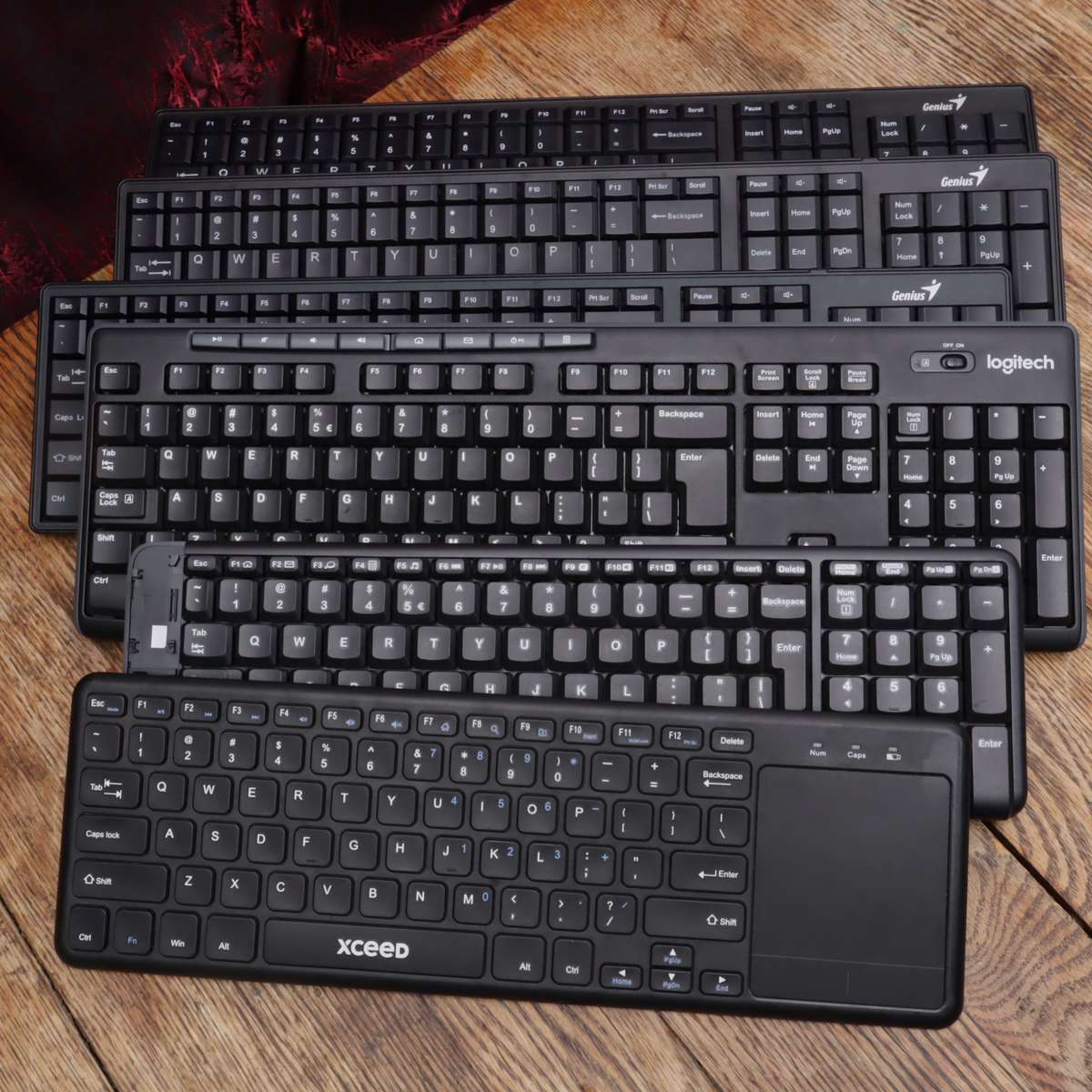 Assorted Wireless Keyboards and Laptop Stands