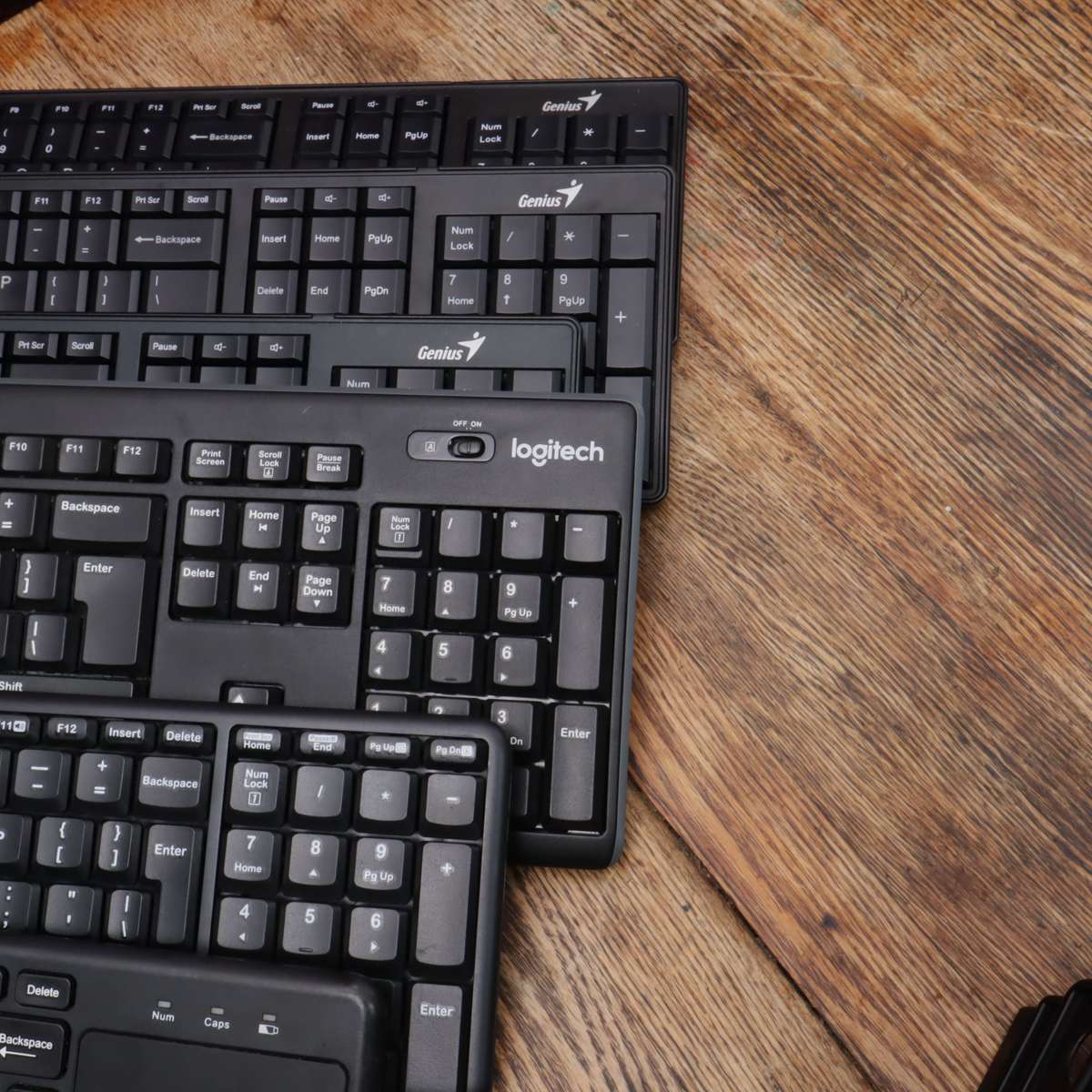 Assorted Wireless Keyboards and Laptop Stands