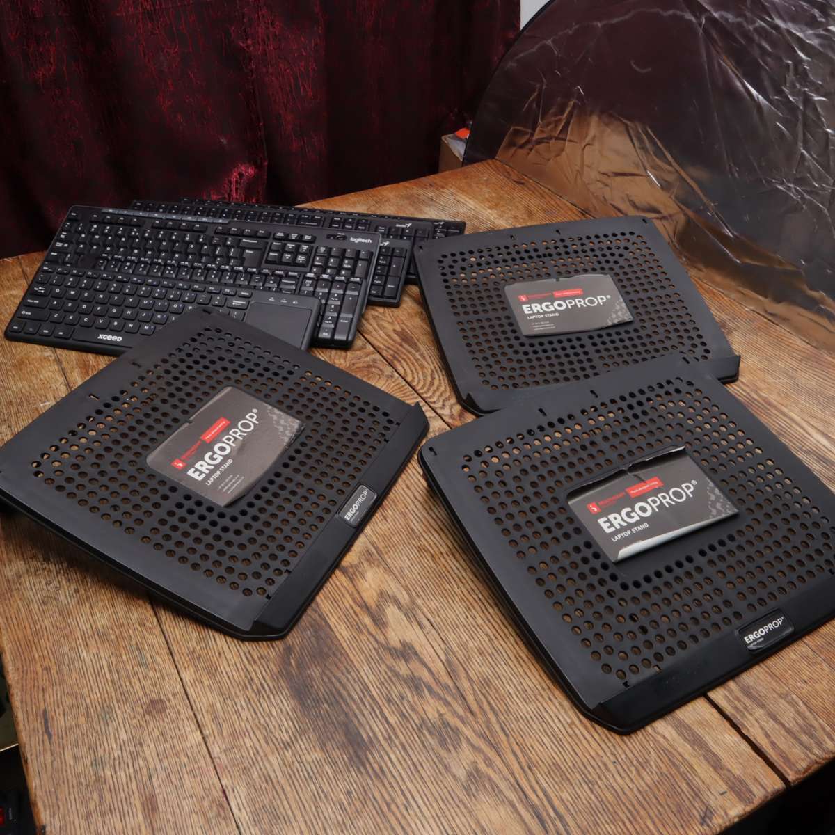 Assorted Wireless Keyboards and Laptop Stands