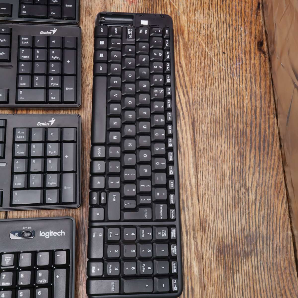 Assorted Wireless Keyboards and Laptop Stands