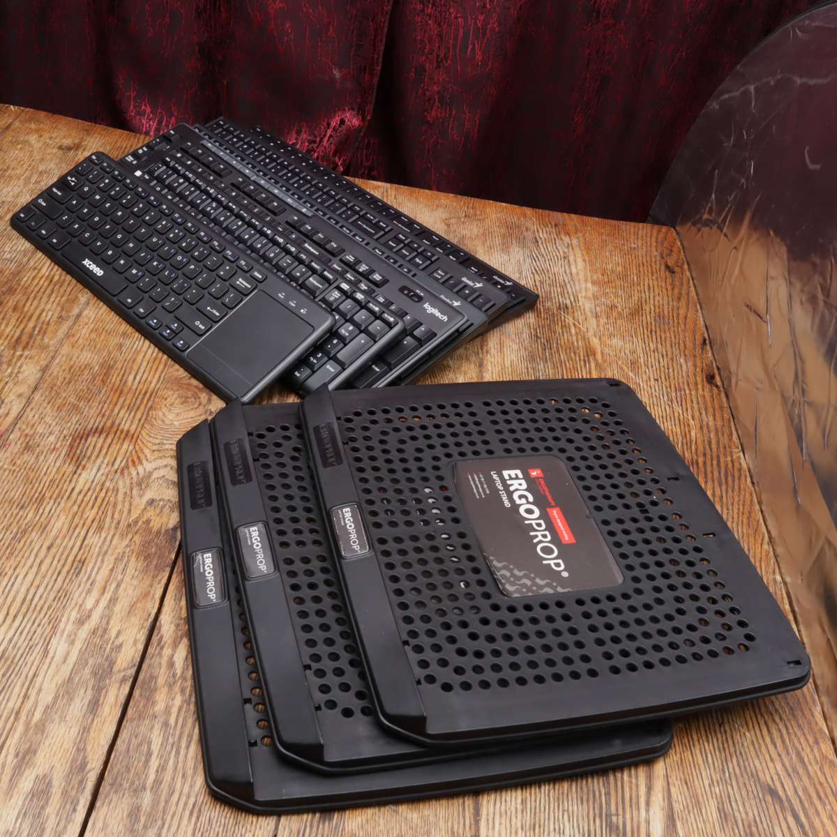 Assorted Wireless Keyboards and Laptop Stands