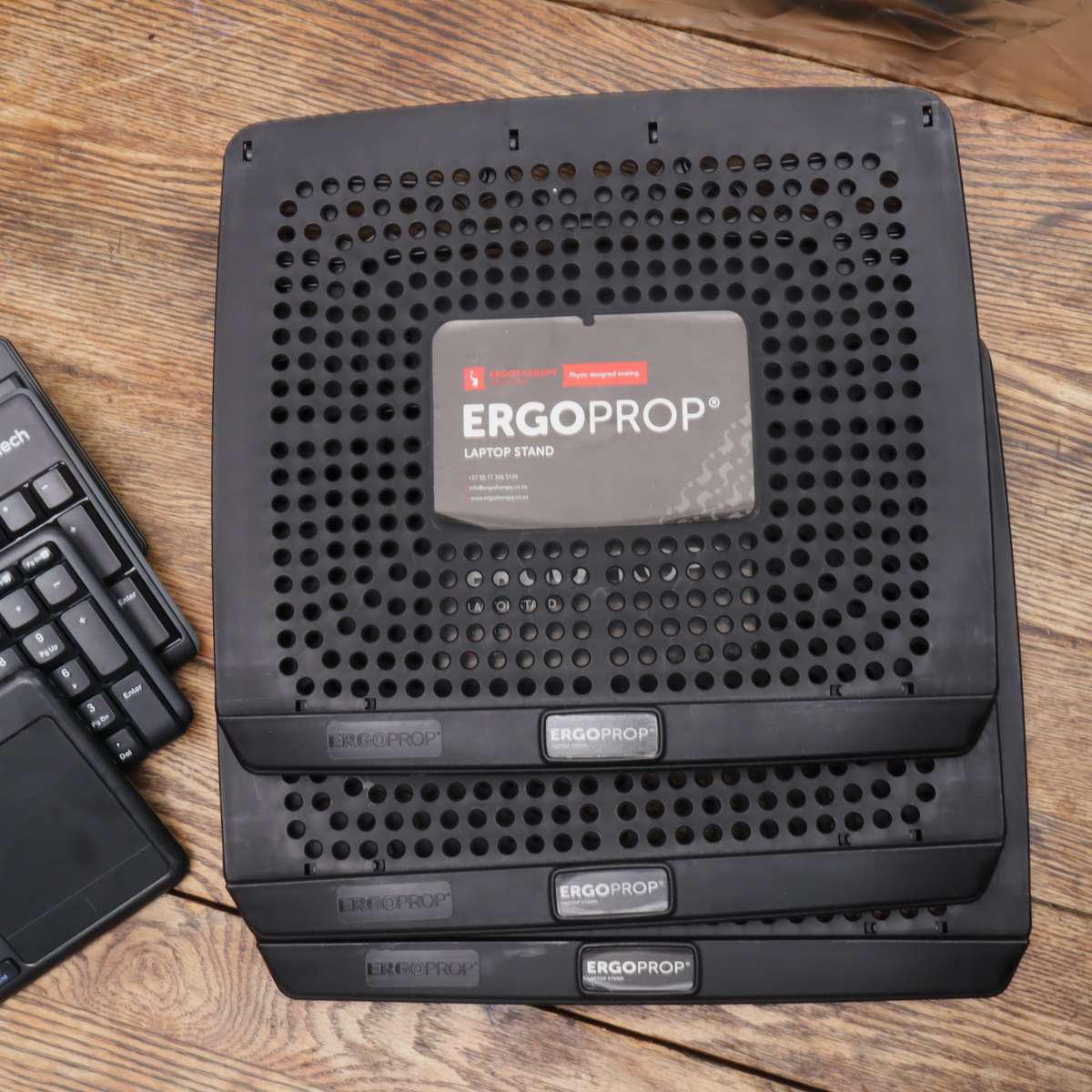 Assorted Wireless Keyboards and Laptop Stands