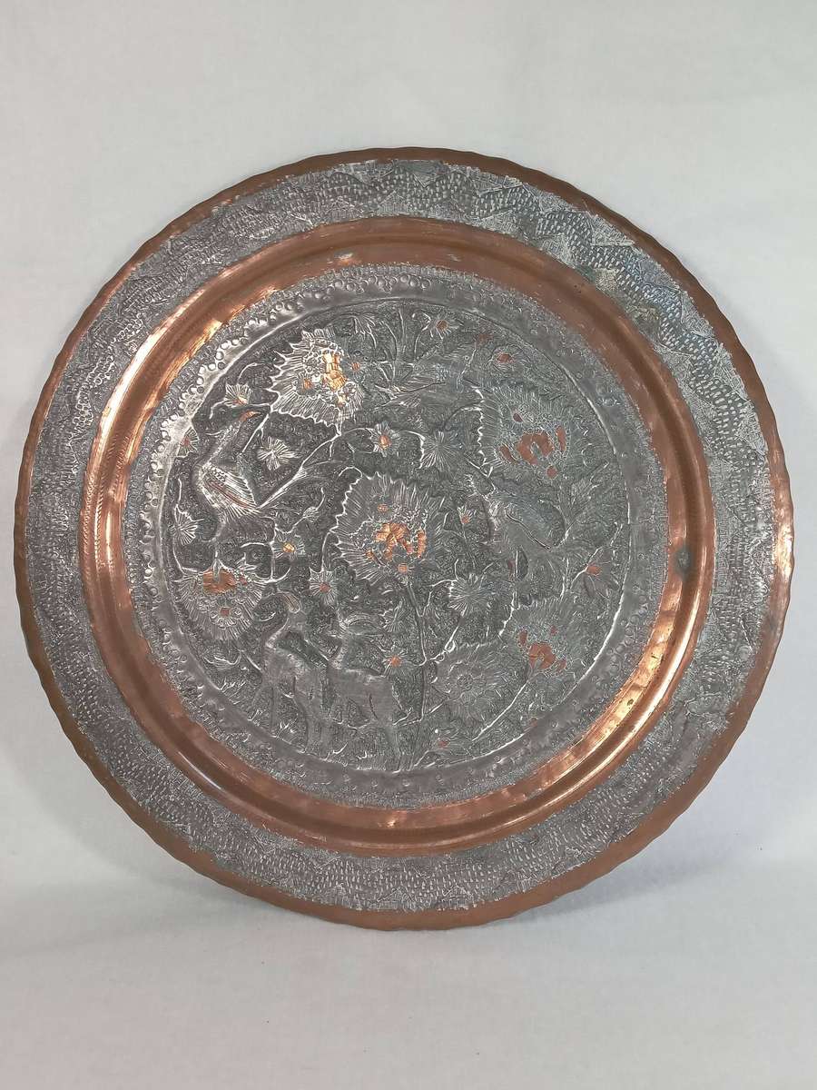 Antique Persian Silvered Copper Charger with Hand Chased Scene Depicting Various Birds and Creatures