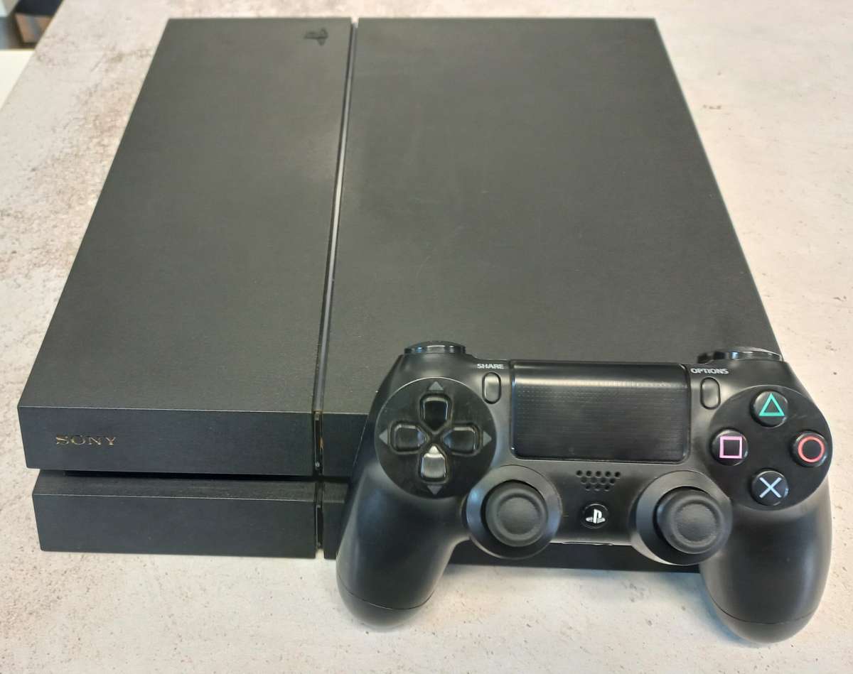 Sony PlayStation 4  1TB Console (CUH-1216B) + 2 Games