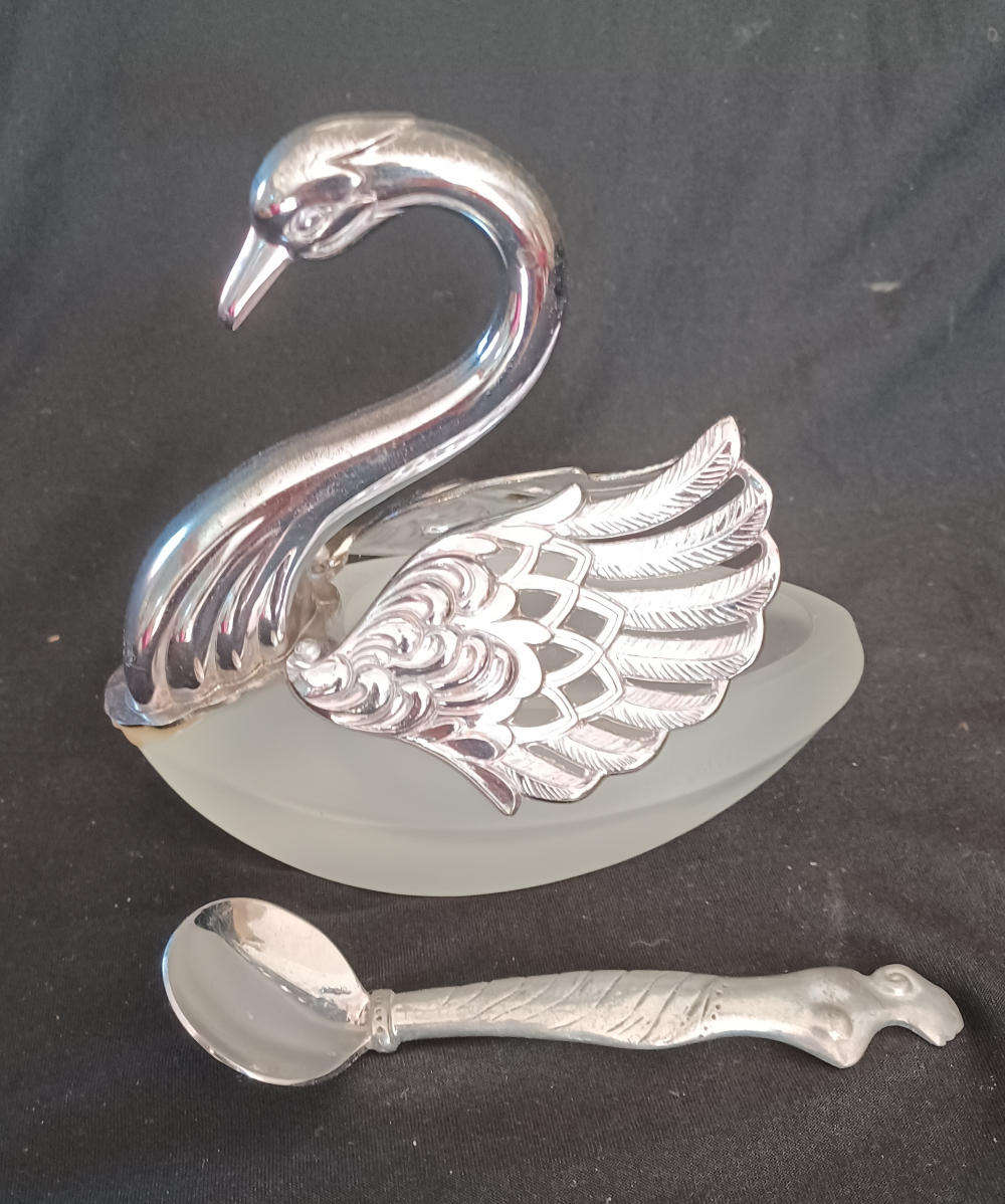 Vintage silver plated swan sugar cellar on frosted glass