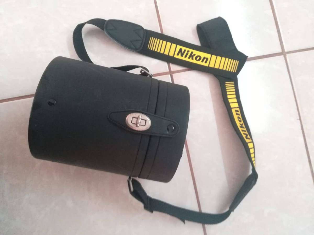 Nikon CL-76 hard leather lens case designed primarily for the Nikon AF-S Zoom-N
