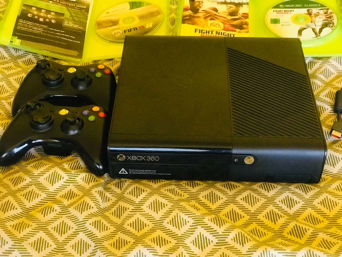 Xbox 360E 2 Controllers and multiple games- 500GB