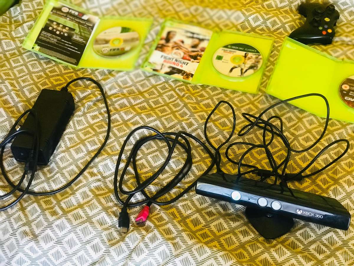 Xbox 360E 2 Controllers and multiple games- 500GB