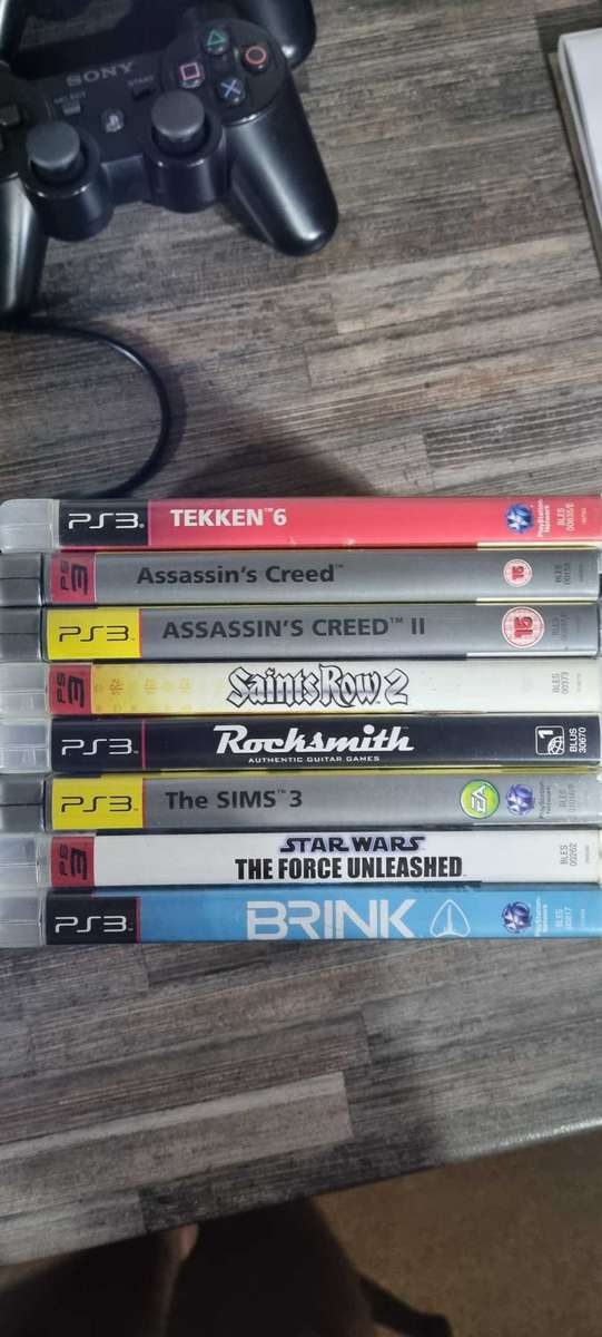 Playstation 3 Console + 8 Games