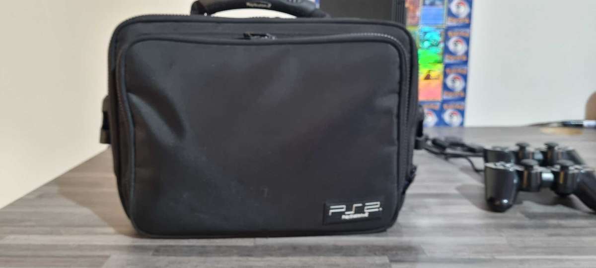 Playstation 2 PHAT Console + 2 x Controllers + 2 x Memory Cards + Original PS2 Carry bag