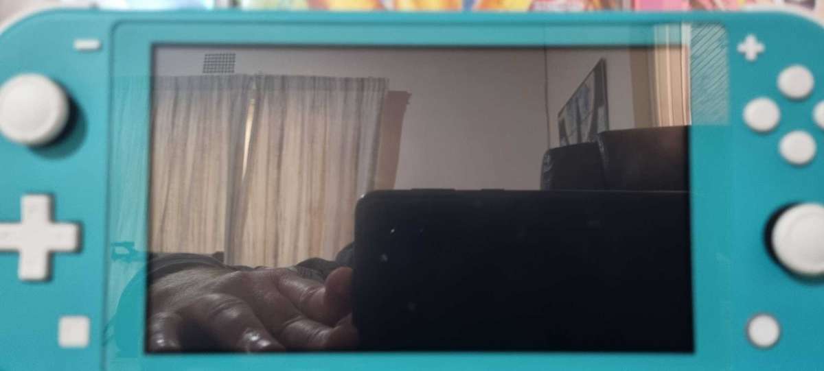 Nintendo Switch Lite + 3 Games + 128GB SD card