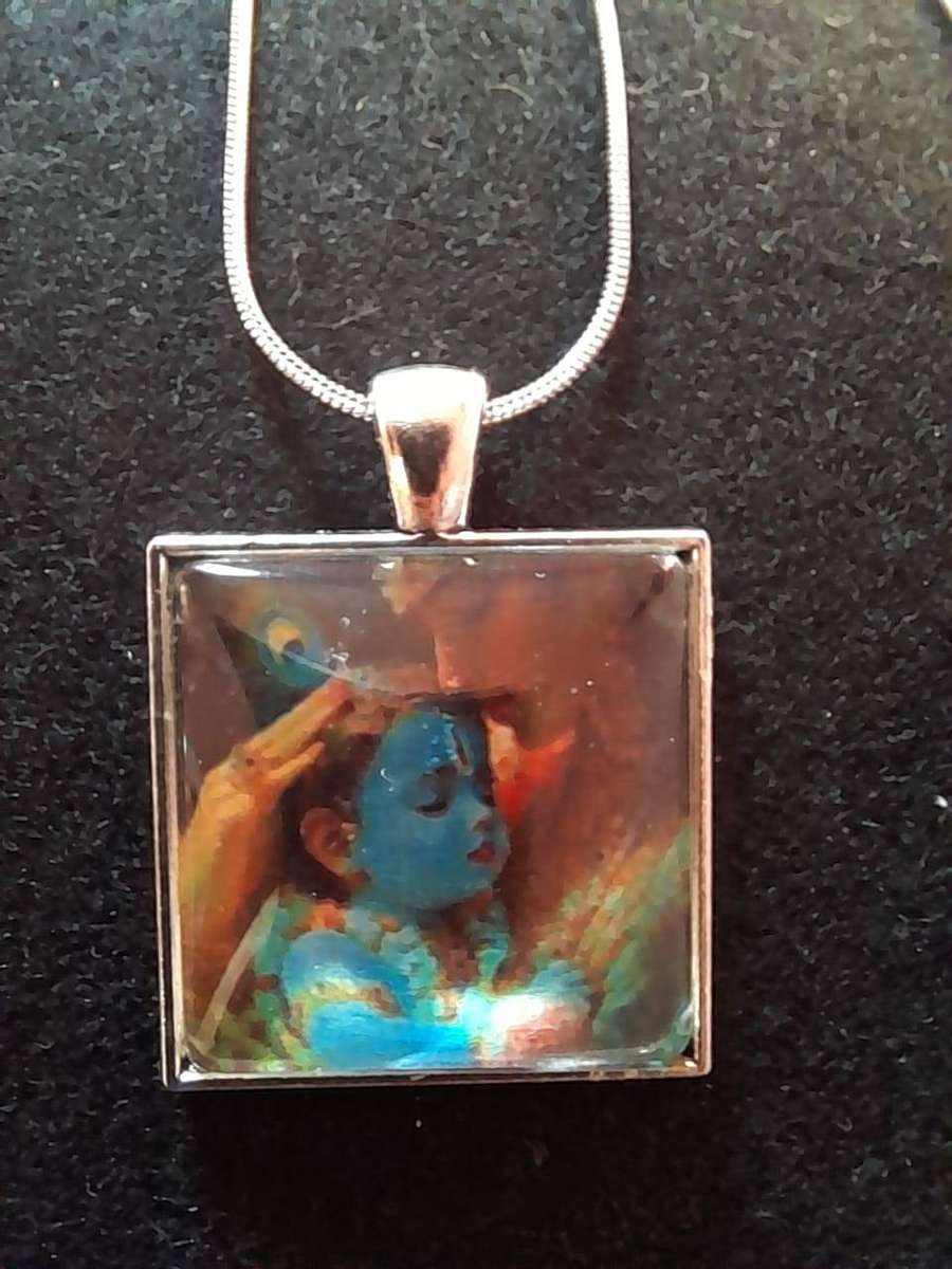 Krishna pendant on silver chain Assorted