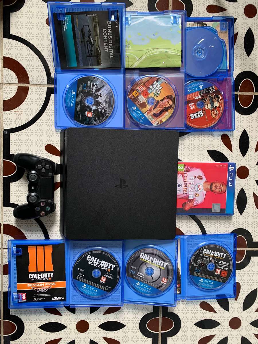 Sony PlayStation 4 Slim (500GB SSD)  Bundle with 7 Games + Accessories