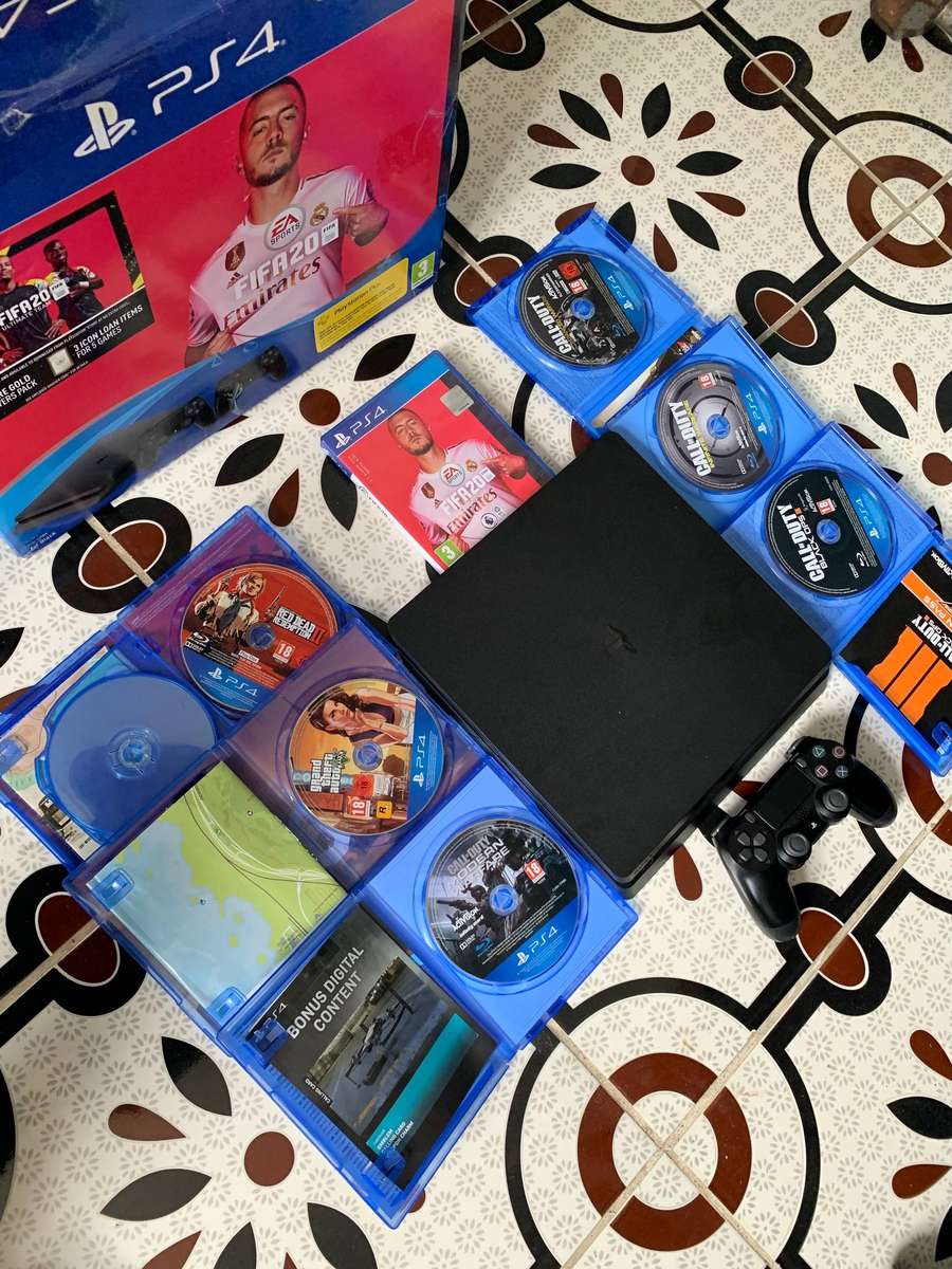 Sony PlayStation 4 Slim (500GB SSD)  Bundle with 7 Games + Accessories