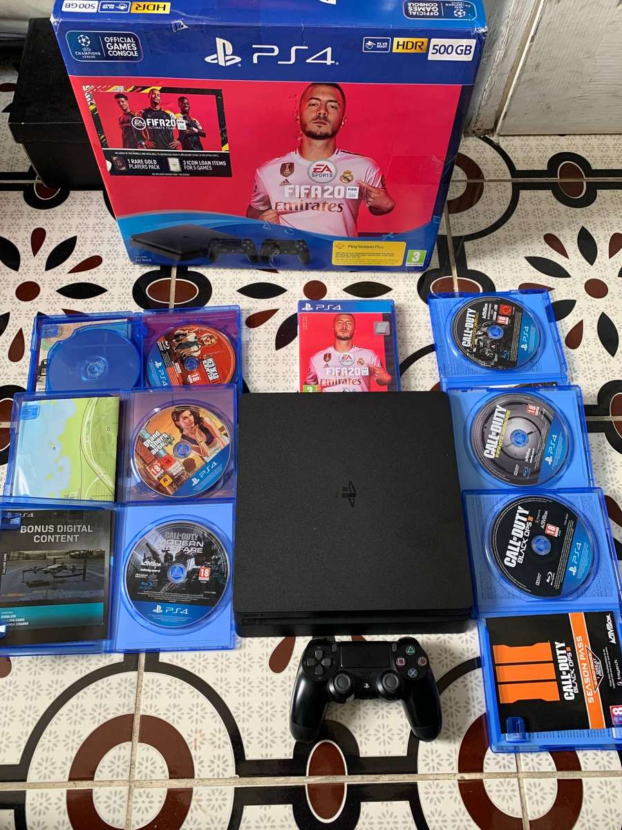 Sony PlayStation 4 Slim (500GB SSD)  Bundle with 7 Games + Accessories